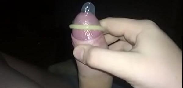  teen twink puts on condom and masturbates